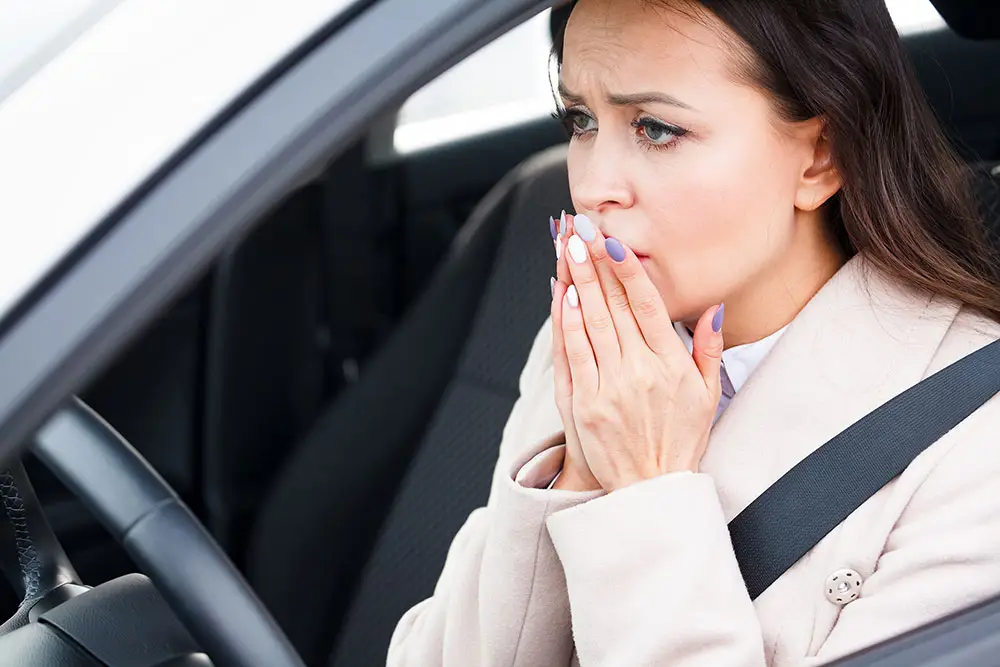 A woman is afraid of driving or the driving test